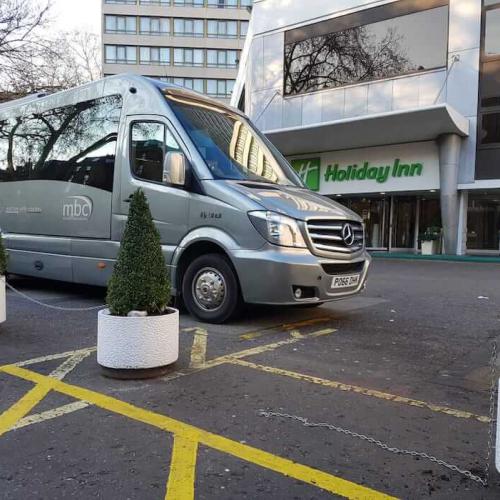 Minibus airport transfer to Holiday Inn